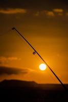 Fishing at sunset photo