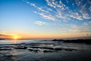 Sunset over the sea photo