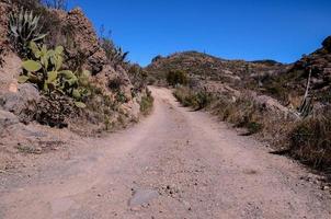 Road through the scenic landscape photo