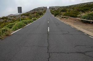 Road through the scenic landscape photo