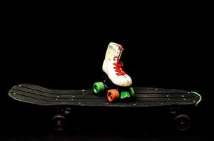 Skates and skateboard photo