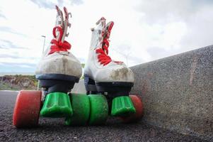 Skates on the sidewalk photo