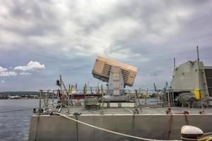 The cassette missile system onboard a frigate.A dangerous weapon. The battery of guns for the defense of military ships. photo