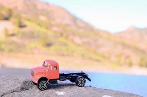 Toy truck on the rock photo