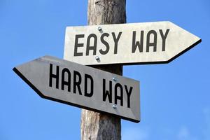 Easy and Hard Way - Wooden Signpost with Two Arrows photo