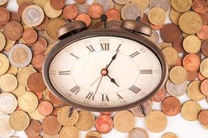 Clock on coins photo