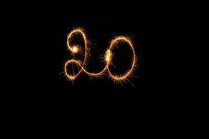 Number made with sparklers ready for your inscriptions on black background photo