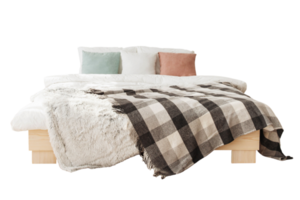 White bed with colorful cushions and blanket isolated on a transparent background png