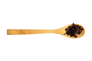 Wooden spoon with condiments isolated on a transparent background png