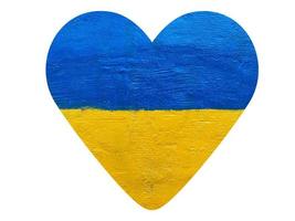 heart with Ukrainian national flag isolated on white photo