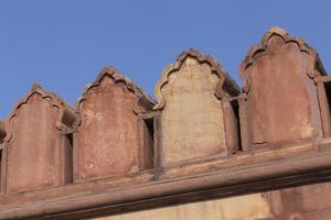 merlones en pared de jama masjid mezquita en antiguo Delhi foto