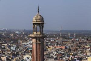 minaret of Jama Masjid mosque in Old Delhi in India photo