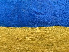 Ukrainian flag painted on wall photo