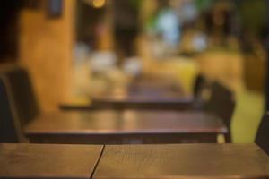 wooden table in the garden, stage for product, brown wood table photo