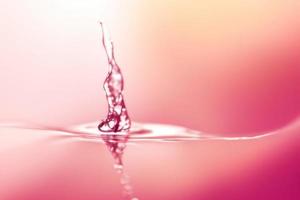 water falling pink liquid background, pink backdrop underwater photo