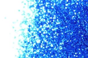 blue background with gradient, bokeh and sparkles on blue background photo