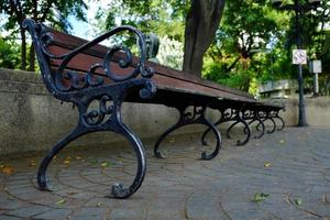 Vintage Long Bench in the Park. photo