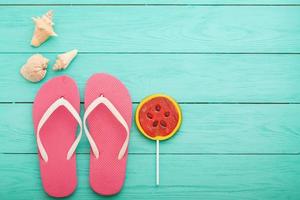 summer bavkground top view close up, summer accesories on wooden background photo