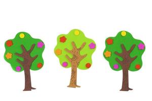 Handcrafted fabulous toy trees made from soft material. Tree on a white background. Garden and fertility concept.