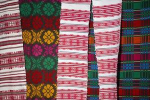Slavic embroidered towels. National Ukrainian or Belarusian ethnic patterns on the fabric. photo