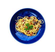 Flat lay or top view spaghetti with clams and mushroom sliced or Italian seafood pasta and parsley on top in blue dish or plate isolated on white background with clipping path and make selection. photo