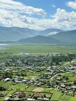 Lake Baikal and the village of Kultuk, Irkutsk region, Russia photo