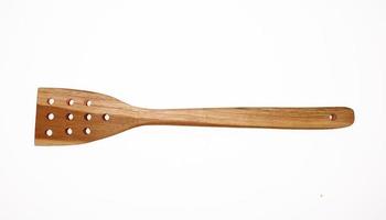 Wooden spatula isolated in white background photo