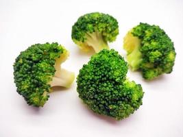 Broccoli collection. Different sides of green fresh broccoli.  Isolated on white background photo