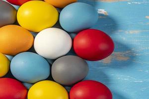 eggs painted in different colors to symbolize the passage of Christian Easter photo