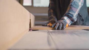 Electric carpentry tools. Carpentry workshop. Knife that cuts the edges of wood in the workshop. video