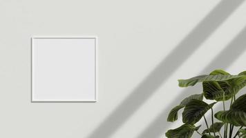 Blank poster frame on the wall with plant. Blank poster frame mockup. Empty picture frame mockup. Blank photo frame