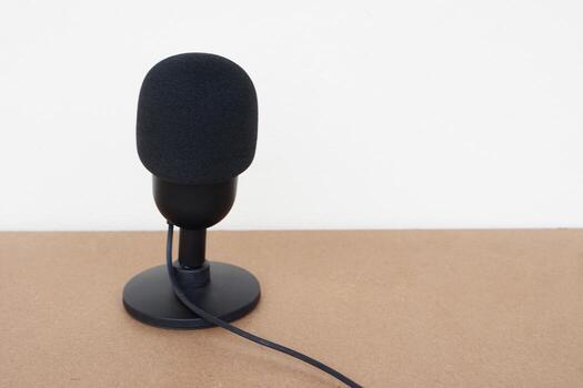 Black microphone. Concept, technology device, microphone usb, useful for sound, voice recording, live streaming. On air, broadcasting. photo