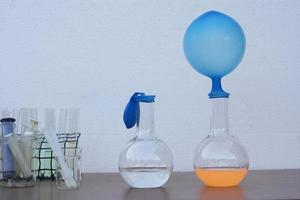 Science experiment about the reaction of chemical in test bottles and balloons. Concept,  Science subject, Education. photo