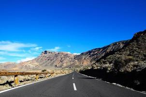 Road through the scenic landscape photo