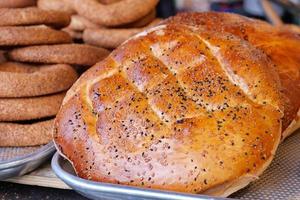 Freshly baked bread on table photo