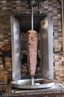 rotating traditional gyros meat close up photo