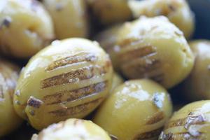 Turkish Grilled olives on table photo