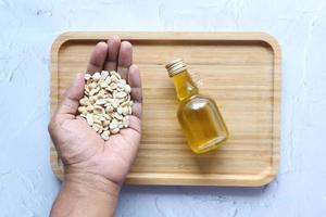 peanuts and oils in a container photo