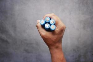 close up of holding Batteries photo