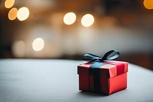 Small cute red gift box with bokeh background with some negative space to put text, background and backdrop. photo