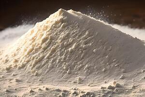 Heap of flour on the table, studio shot and marketing presentation. photo