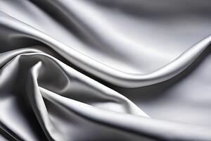 Silver satin or silk fabric wavy texture and pattern background background. photo