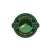 outdoor nature panoramic mountain peak high hill hiking circle badge modern logo design vector