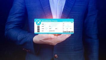 Hand holding boarding pass tickets air travel concept, Choosing checking electronic flight ticket. photo