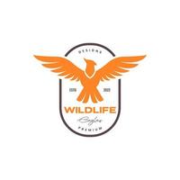 flying free freedom crowned eagle flip wings badge vintage colored logo design vector