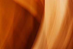 Abstract orange background with some smooth lines in it. photo