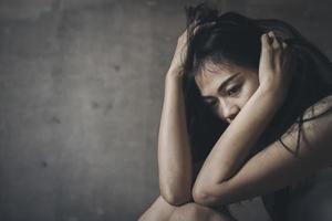 Young depressed woman, domestic violence and rape. stop abusing violence,  human trafficking, stop violence against women, Human is not a product. Stop women abuse, Human rights violations. photo