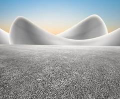 Abstract concrete building with wide unmanned asphalt pavement, clean bright sky background. photo