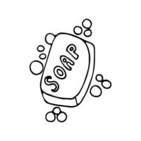 Bar of soap drawn in doodle style. Black and white soap vector illustration. Hand drawn soap with bubbles and lettering saying 'soap' isolated on white background.