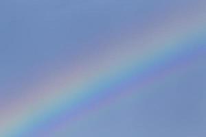 rainbow in a blue sky photo